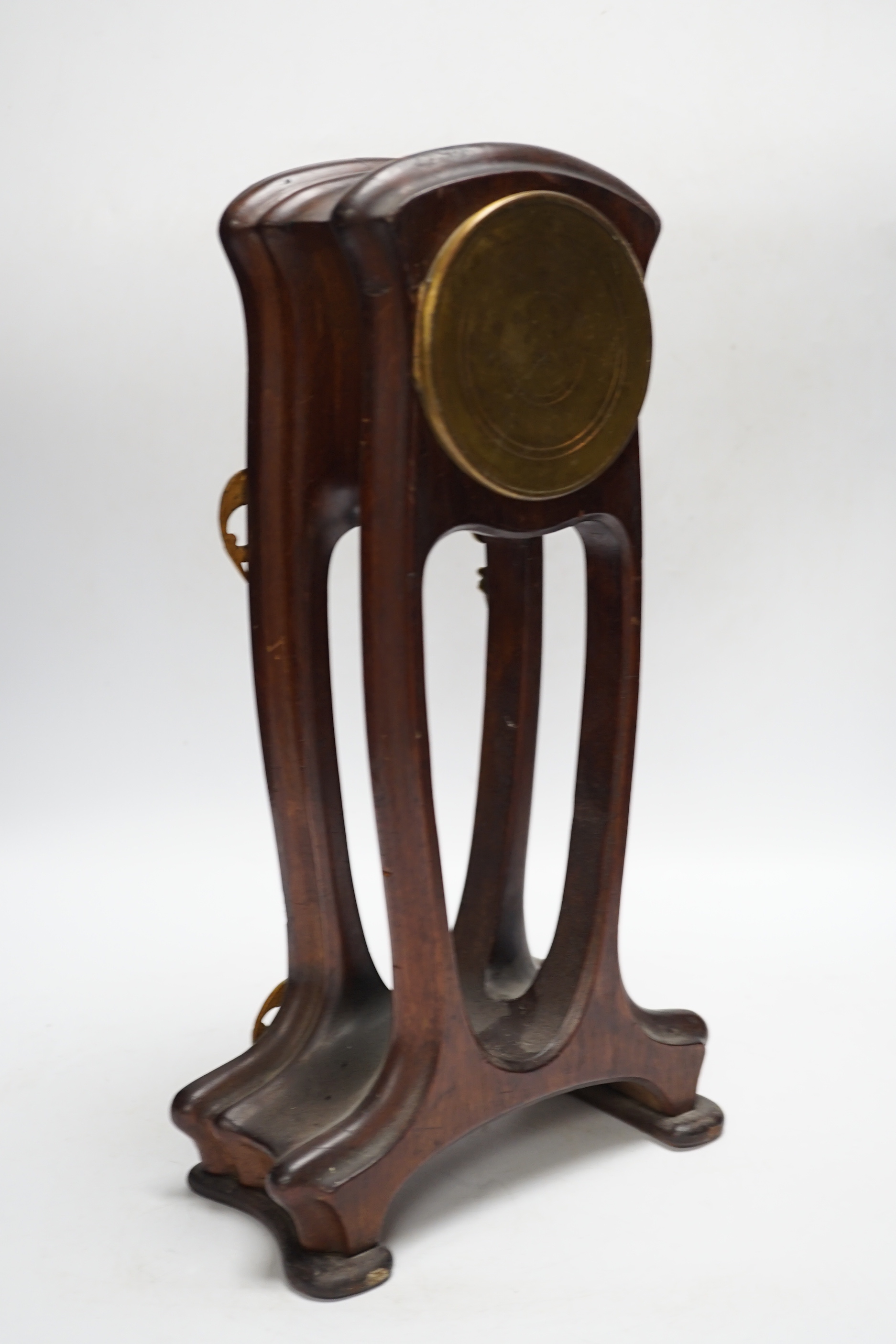 A French Art Nouveau mahogany and brass-mounted mantel clock, 39cm